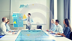 Group of smiling businesspeople meeting in office