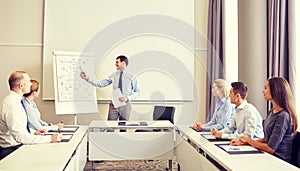 Group of smiling businesspeople meeting in office