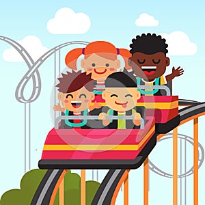 Group of smiling kids riding roller coaster