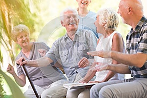 Group of smiling senior friends