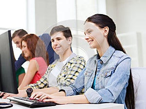 Group of smiling students having discussion