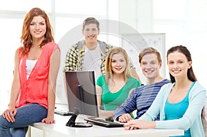 Group of smiling students having discussion