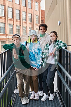 Group of smiling teenagers hanging out