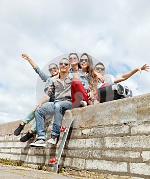 Group of smiling teenagers hanging out