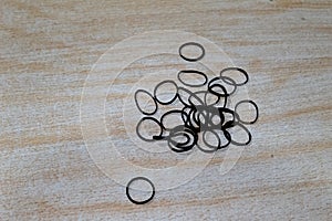 A group of some black colored elastic rubbers