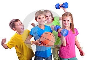 Group of sporty children friends with dumbbells and ball