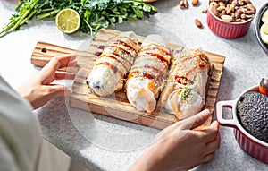 Group of spring rolls with rice paper filled with vegetables.