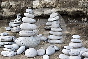Group of stone cairn towers, poise stones, rock zen sculpture