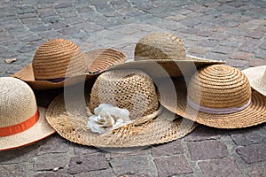 Group of straw Hats on Sampietrini Ground