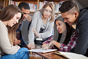 Group, students or brainstorming for education in library or diversity for knowledge in university. Friends, learning