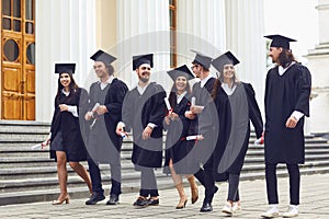 Group of students graduates go against the university college.