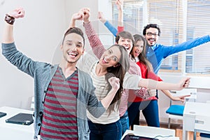 Group of students having fun at college