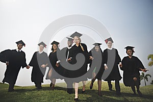 Group Students Holding Hands Graduation Concept