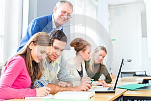 Group of students learning at college