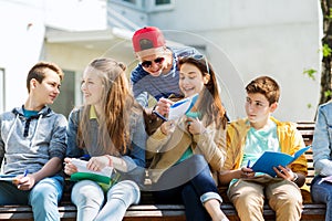 Group of students with notebooks at school yard