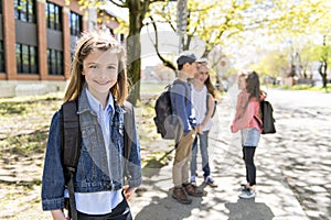 A Group of students outside at school standing together