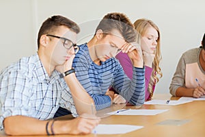 Group of students with papers