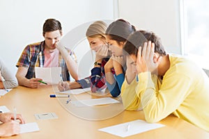 Group of students with papers