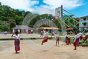 Group of students playing traditional game together