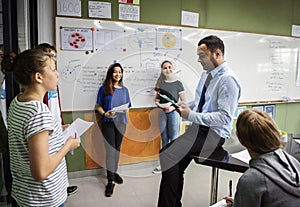 Group of students presentation in classroom
