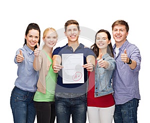 Group of students showing test and thumbs up