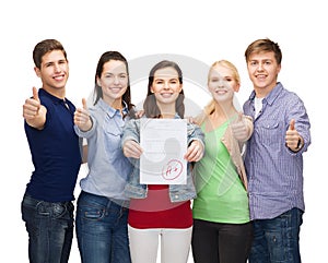 Group of students showing test and thumbs up