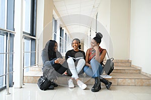 Group of students sitting on steps