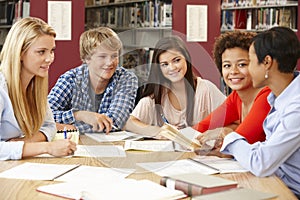 Group of students working together in library