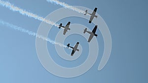 Group of stunt planes overhead