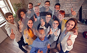 Group of success business team giving thumbs up