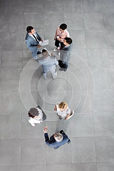 Group of success employed talking on business meeting