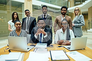 A group of successful afro americans, europeans ,arabic and korean businessman and businesswoman working in the office