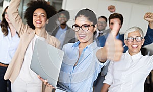 Group of successful business people in office photo