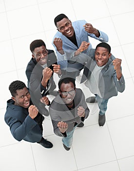 Group of successful young people looking at the camera