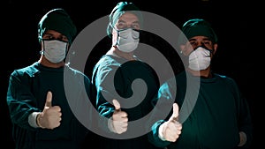 Group Surgeon doctor consent after Patient surgery in hospital operating room. Teamwork medical doctor working performing surgery.