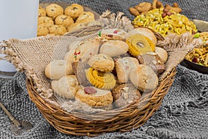 Group of Sweet And Tasty Mixed Cookies or Biscuits with Namkeen Served in Basket
