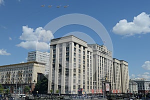 Group of tactical front-line bombers with variable sweep wing Su-24M Fencer in the skies over Moscow during the parade dedicated