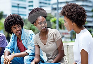 Group of talking african american young adults