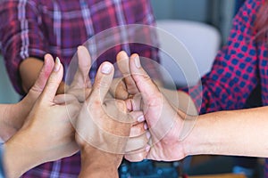 Group of team thumb up for success