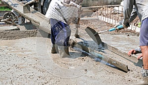 Group Team of worker working material in site. mixer cement truck pour fluid concrete into floor house