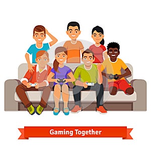 Group of teen friends having a video games party