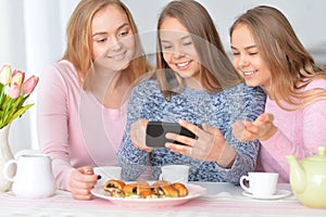 Group of teenage girls with smartphone