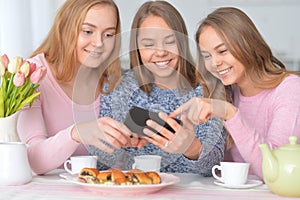 Group of teenage girls with smartphone