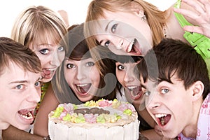 Group of teenagers celebrate birthday.