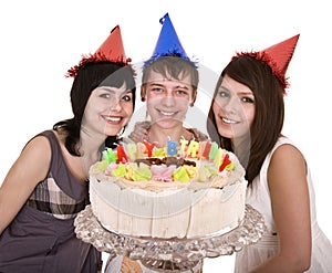 Group of teenagers celebrate happy birthday.