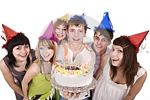 Group of teenagers celebrate happy birthday.