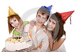 Group of teenagers celebrate happy birthday.