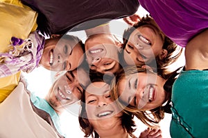 Group of teenagers in circle photo