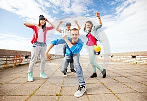 Group of teenagers dancing