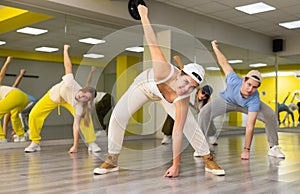 Group of teenagers enjoying dance class together